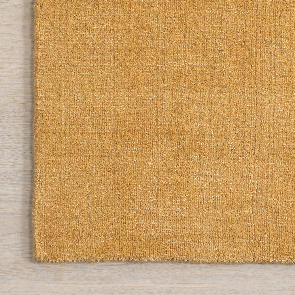Arrel Speckled Wool-Blend Rug | Golden Butter