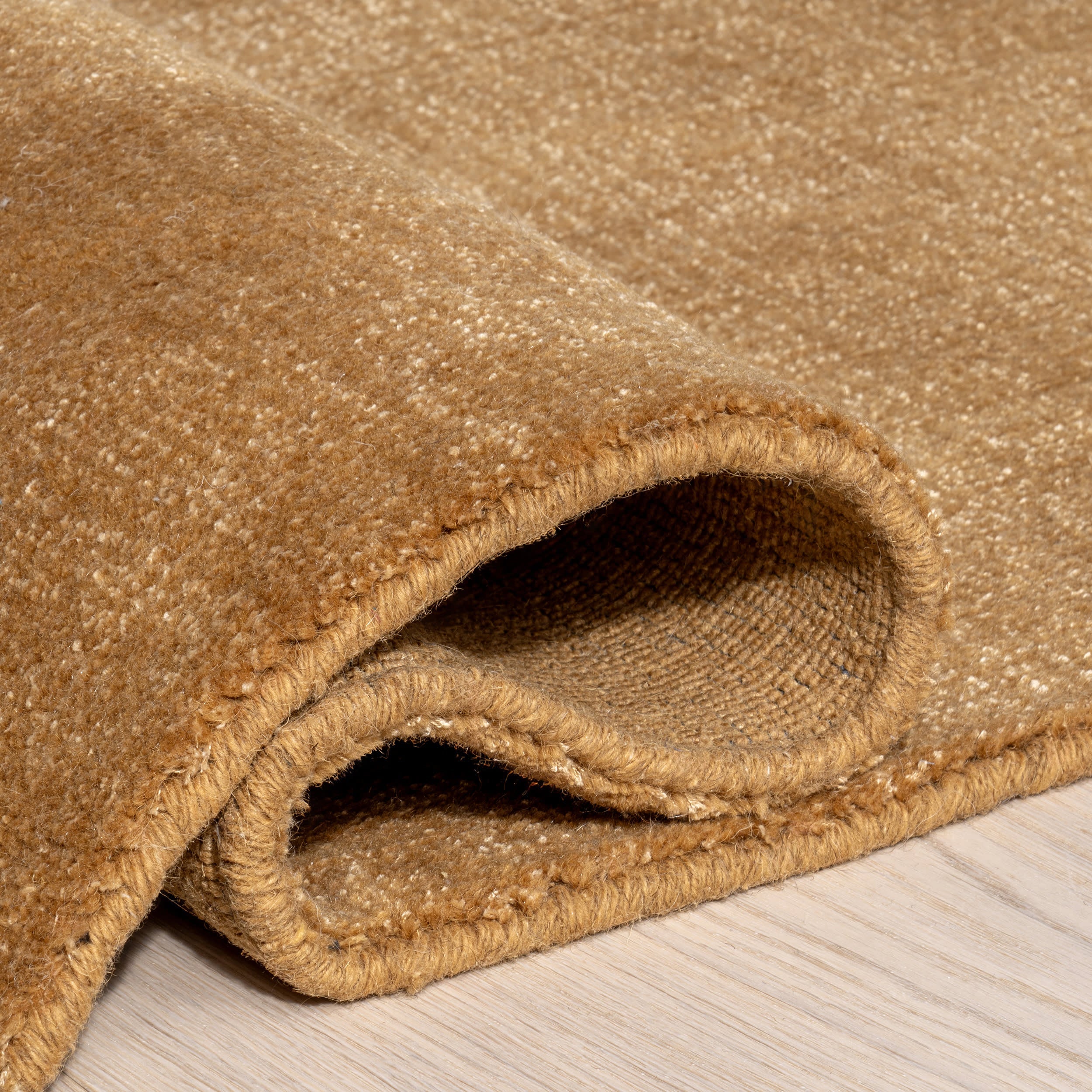 Arrel Speckled Wool-Blend Rug | Wheat