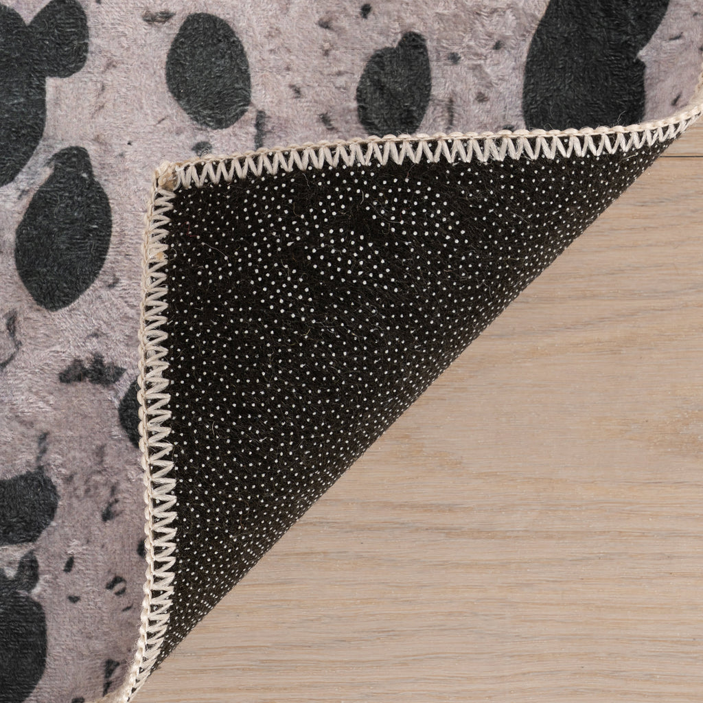 Aricela Modern Animal Print Washable Rug | Black