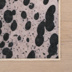 Aricela Modern Animal Print Washable Rug | Black