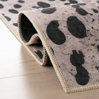 Aricela Modern Animal Print Washable Rug | Black