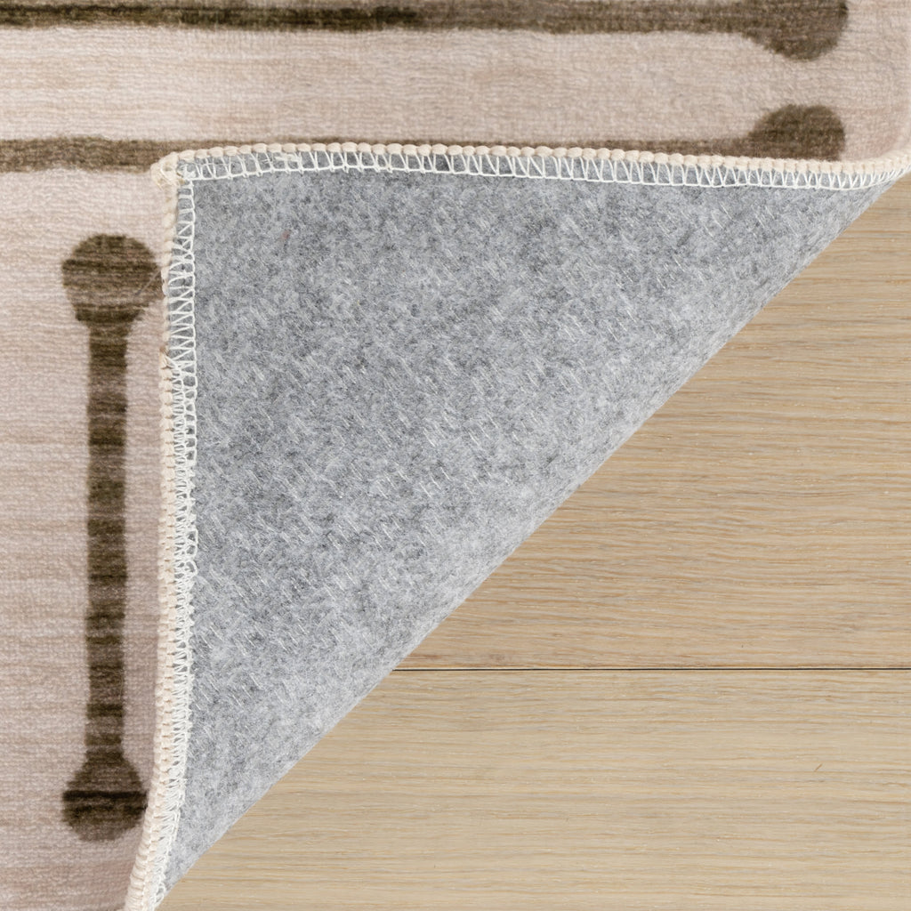 Revelyn Geometric Washable Rug | Brown