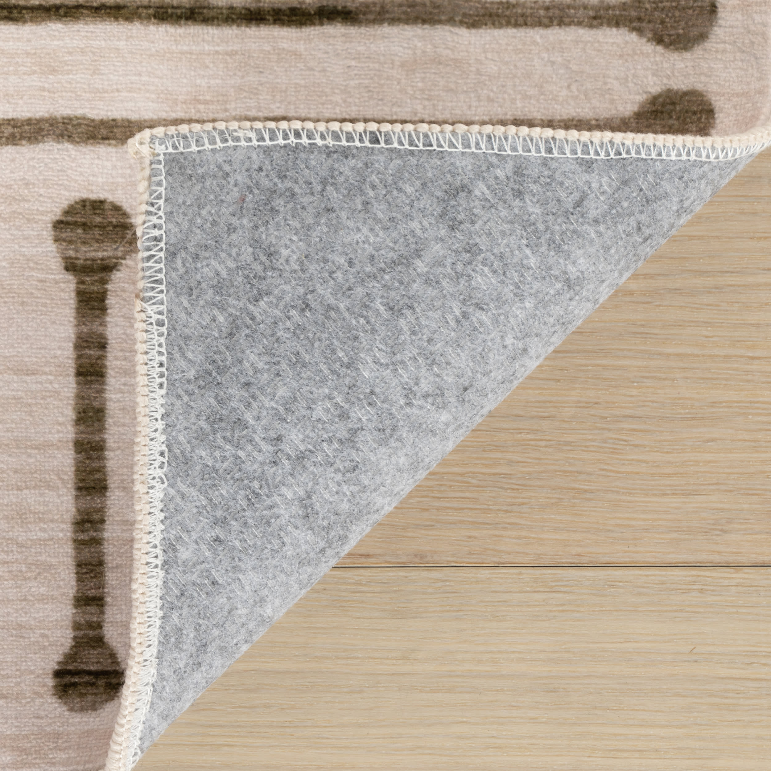 Revelyn Geometric Washable Rug | Brown