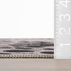 Aricela Modern Animal Print Washable Rug | Black