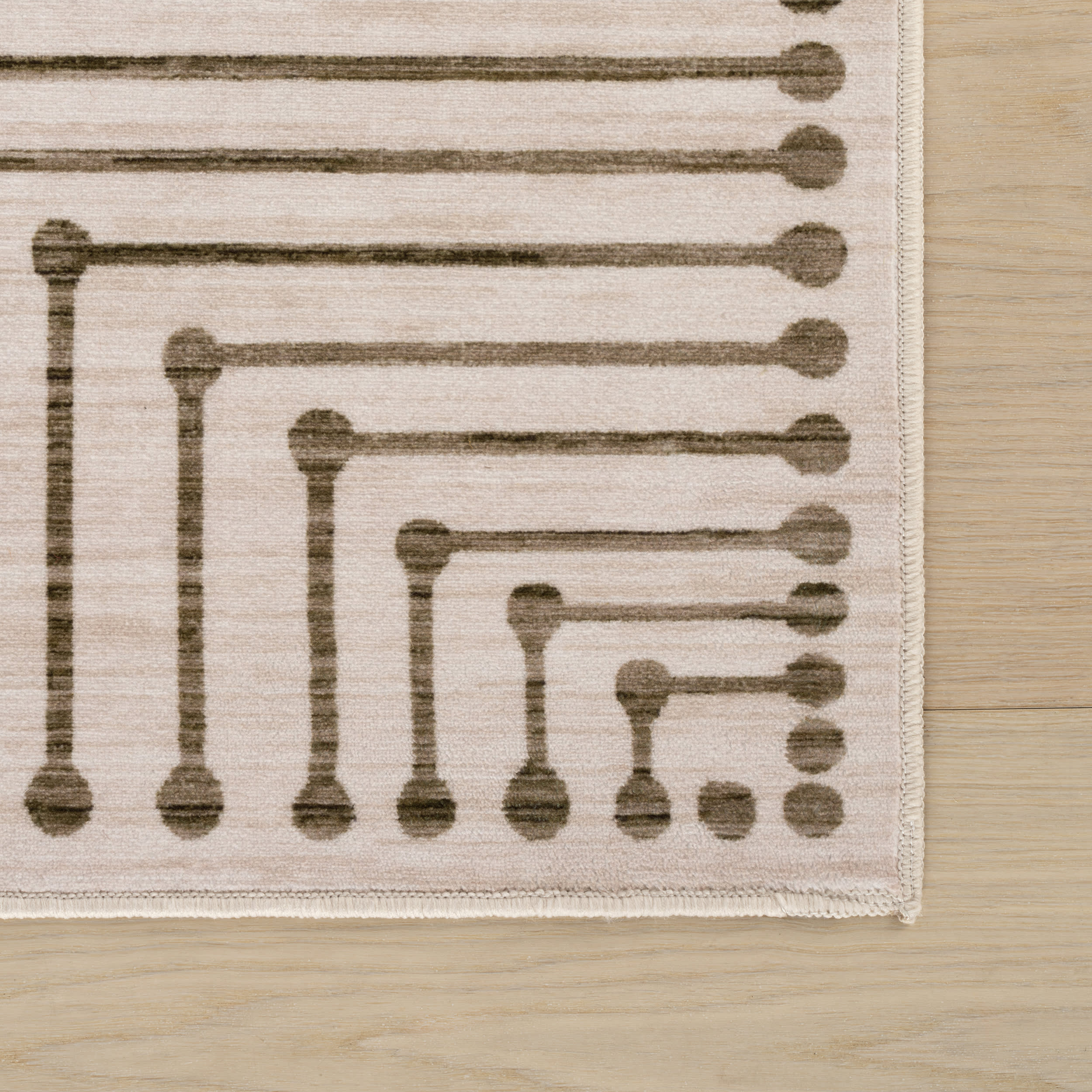 Revelyn Geometric Washable Rug | Brown